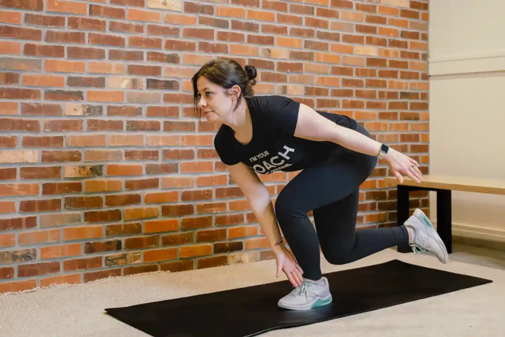 Tone Your Arms in Just One Week: Achieve Results Without the Gym! 1 A person exercising their arms at home with light weights Hamilton