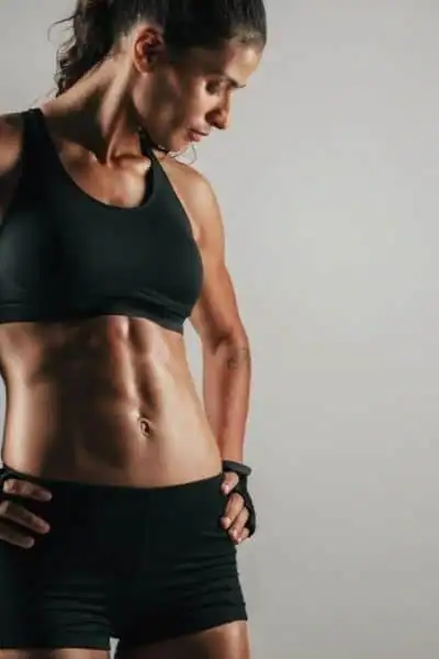 Toning Up at Home: The Ultimate Guide to Bodyweight Exercises 2 Image of woman's toned stomach after bodyweight exercises Hamilton and non-surgical treatment from Lipo 360