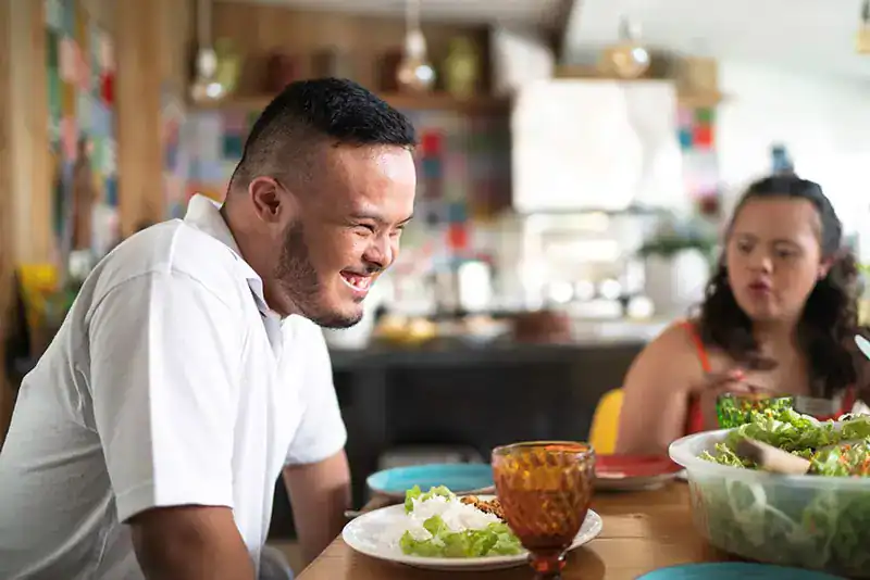 Empowering Weight Loss: A Comprehensive Guide for Individuals with Disabilities 2 Image of a disabled man and balance around nutrition to aid weight loss Hamilton