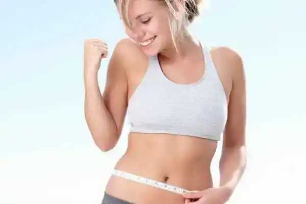 Unraveling the Mystery: Where Does the Body Fat Loss From First? 3 Image of woman happy with fat loss Hamilton