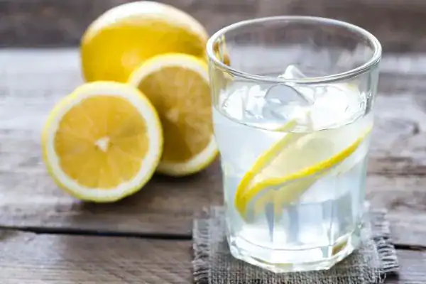 Hydration: The Secret Ingredient for a Toned Stomach and Enhanced Fitness 2 Image of lemon water to aid hydration Hamilton