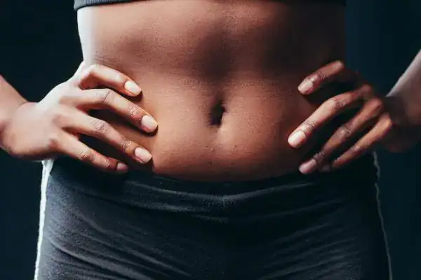 Toning Your Stomach: The Ultimate Guide to Achieving a Sculpted Stomach While Shedding Pounds 1 Image of a toned stomach after non surgical treatment Hamilton